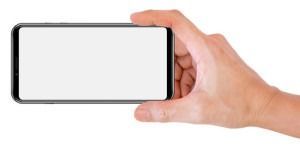 Hand holding a smartphone in landscape orientation with a blank white screen