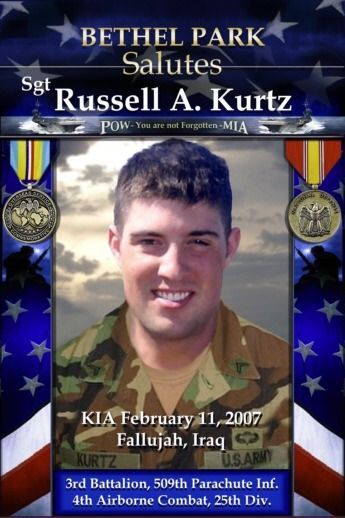 Memorial tribute poster for Sgt. Russell A. Kurtz with portrait, medals, and American flags