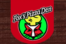 Fox’s Pizza Den logo on a red shield with a green cartoon fox face and black-and-white banner
