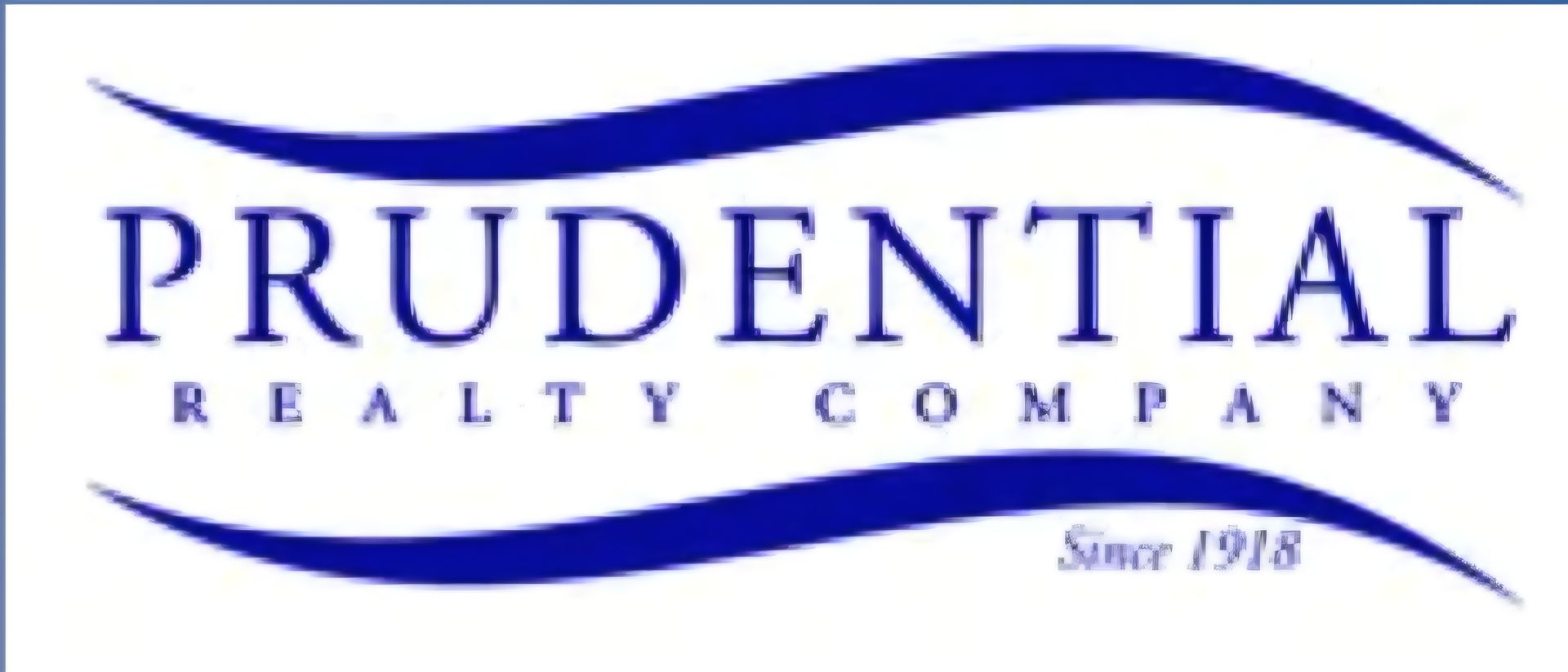 Prudential Realty Company logo with blue swoosh and “Since 1918” text