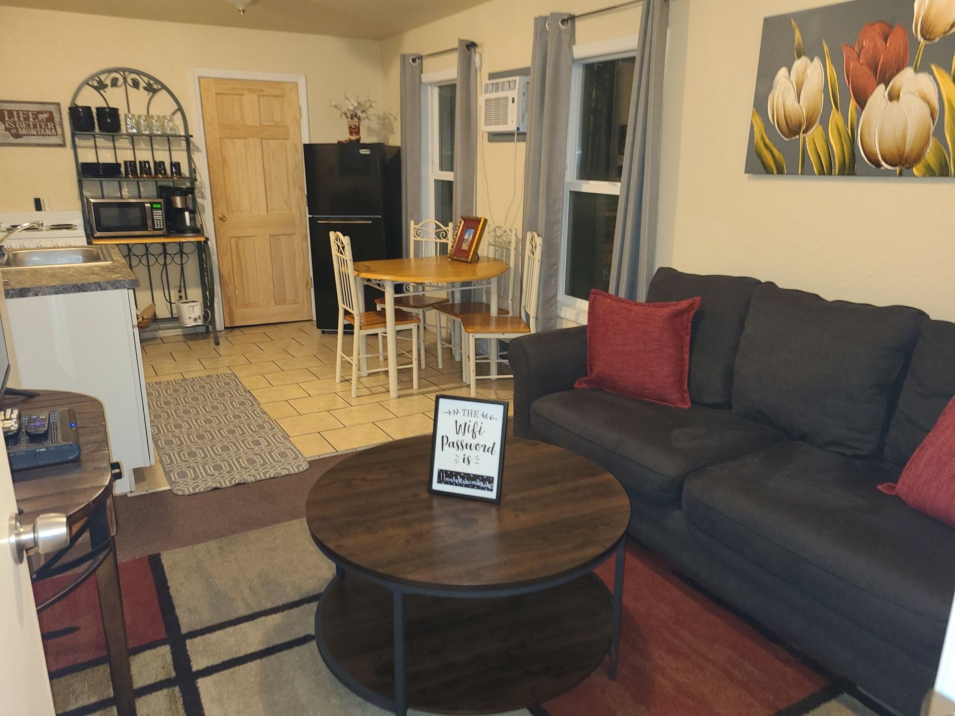 A living room with a couch and a coffee table
