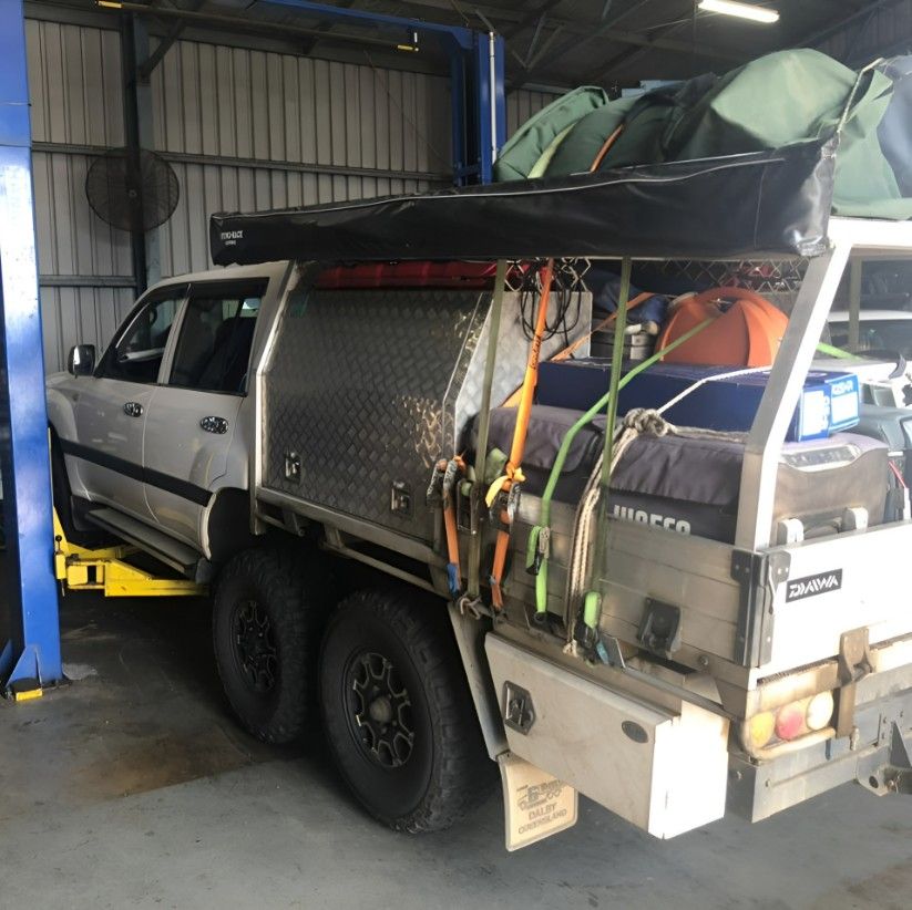 A Truck is on a Lift — JJE Automotive In Yarrawonga, NT