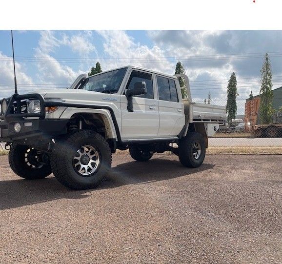 A 4x4 Car is Sitting on Top of a Metal Ramp — JJE Automotive In Yarrawonga, NT