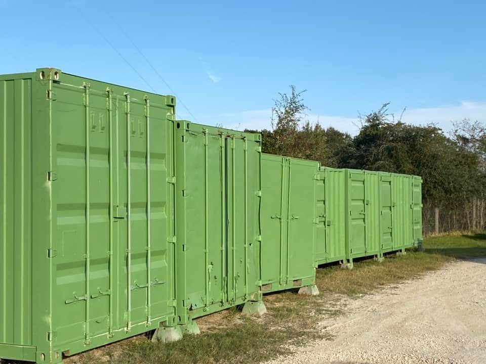 Secure RV storage facility with organized parking and access lanes.