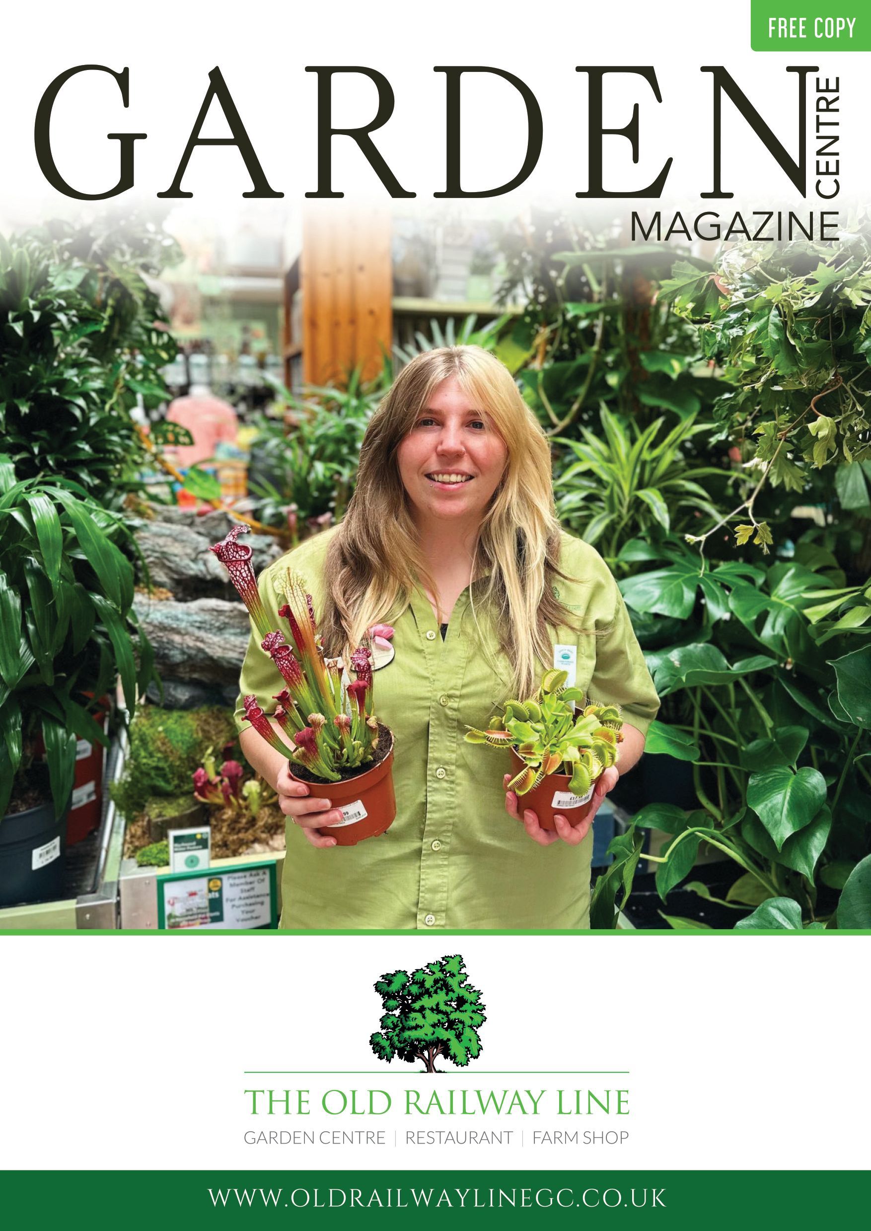 A person in a green shirt holds two potted pitcher plants in a garden center, featured on a magazine cover.
