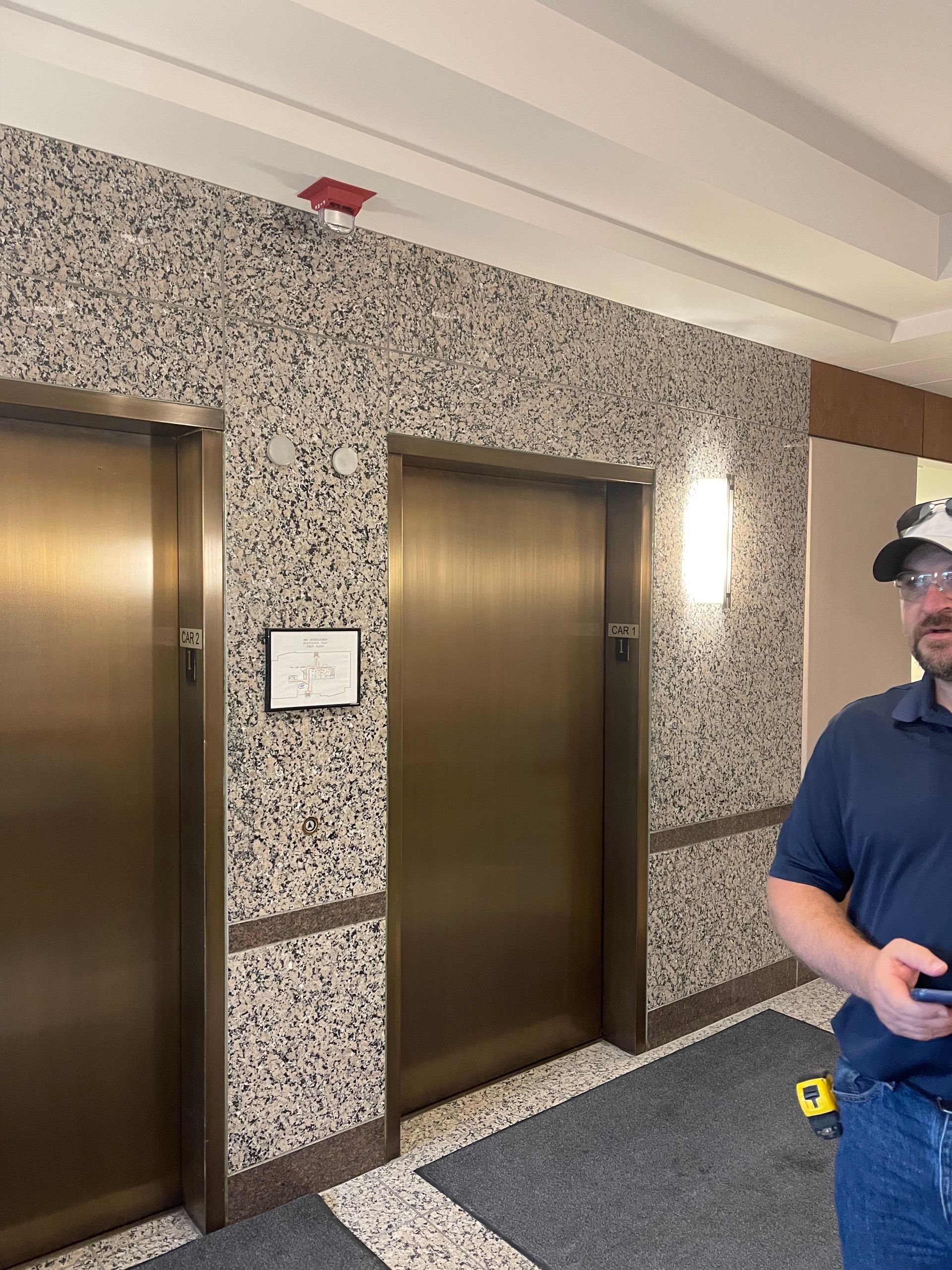 Elevator consultant surveying a modernization project
