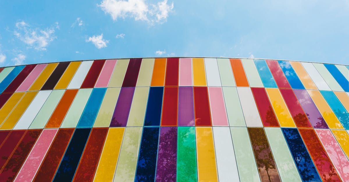 Colorful brick building under blue sky, symbolizing the layered complexity and structure of leadership profiles.