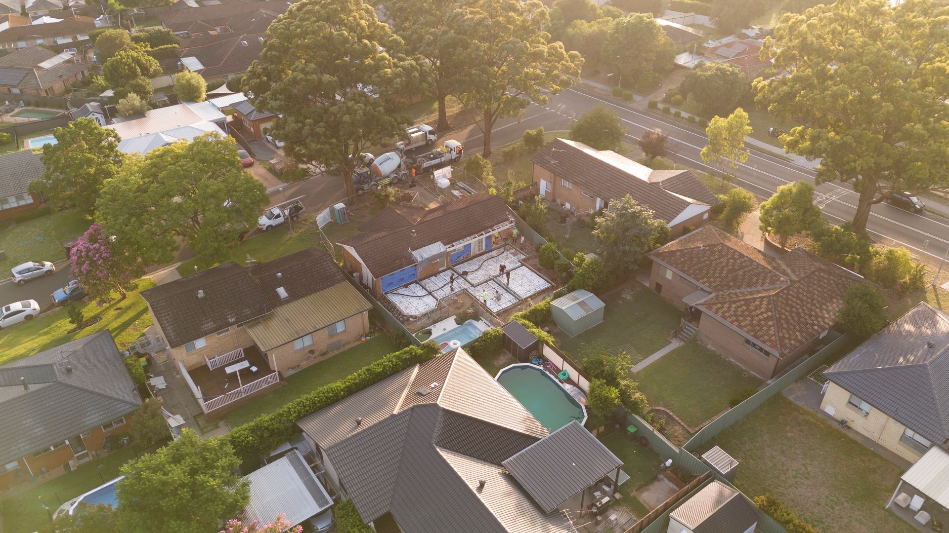 Aerial View of a Suburban Neighborhood With Houses, Trees, and a Backyard Pool — Matt Made Building in Camden, NSW
