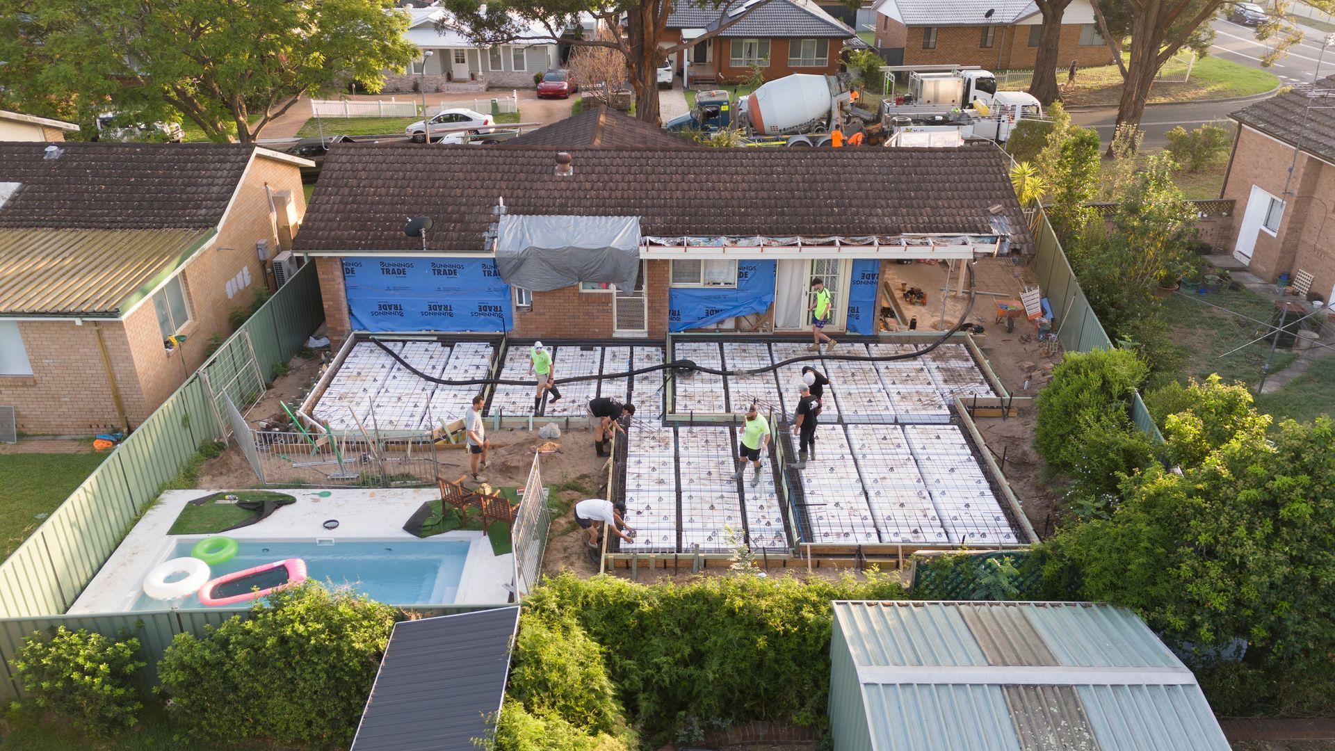 Backyard Pool and Patio Under Construction, With Workers and Materials — Matt Made Building in Camden, NSW