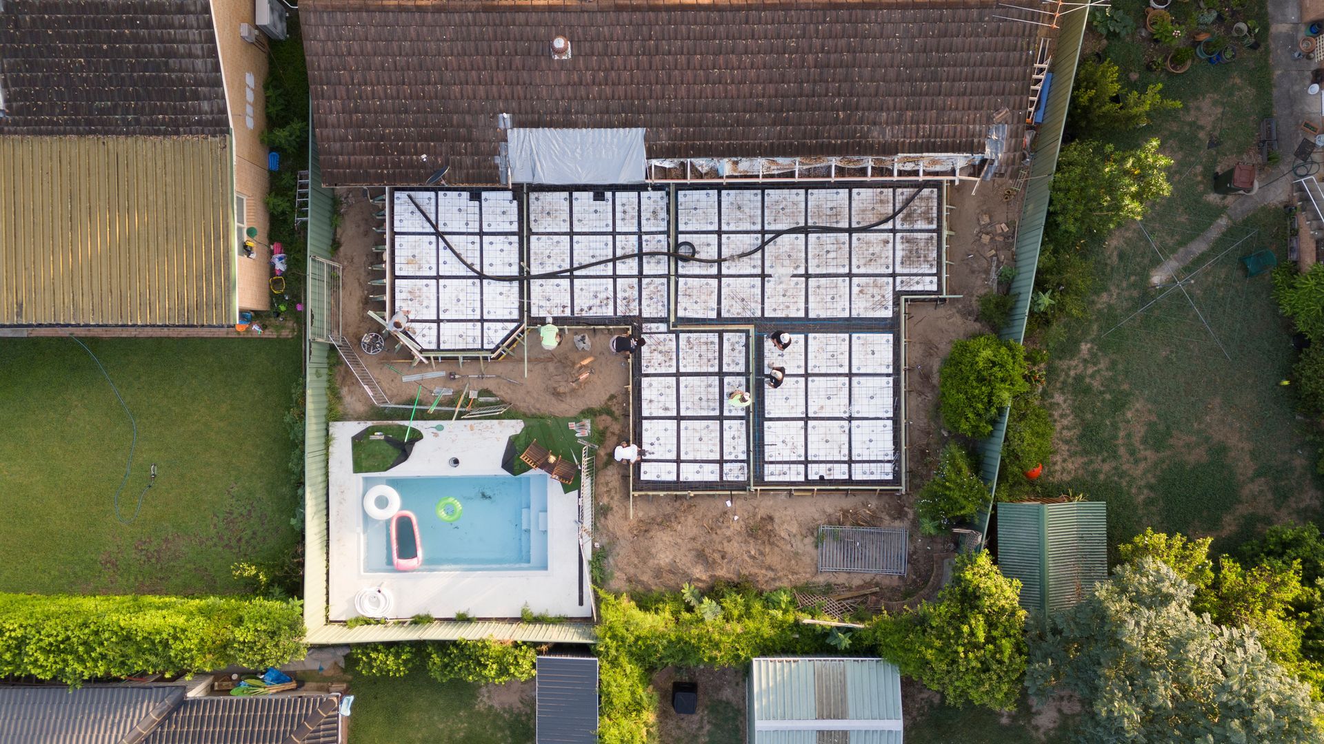 Aerial View of a Backyard With a Swimming Pool, Patio — Matt Made Building in Camden, NSW