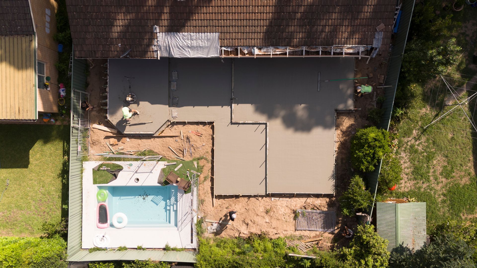 Overhead View of a Backyard With a Patio, Small Pool, and Patio Furniture — Matt Made Building in Camden, NSW