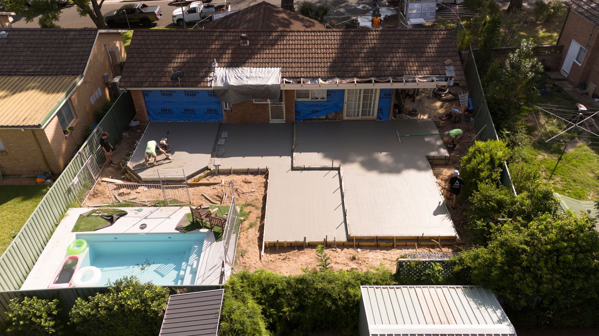 Aerial View of a Backyard With a Pool, Patio, and Single-story House — Matt Made Building in Camden, NSW