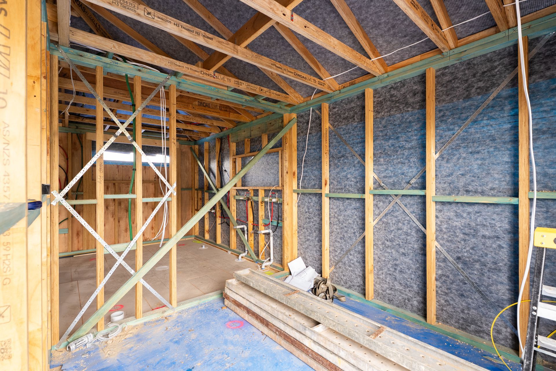 Framed House Interior Under Construction With Exposed Wood Beams — Matt Made Building in Camden, NSW