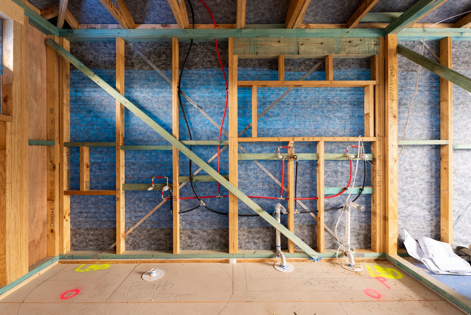Framed Wall Interior With Blue Insulation and Electrical Wiring — Matt Made Building in Camden, NSW