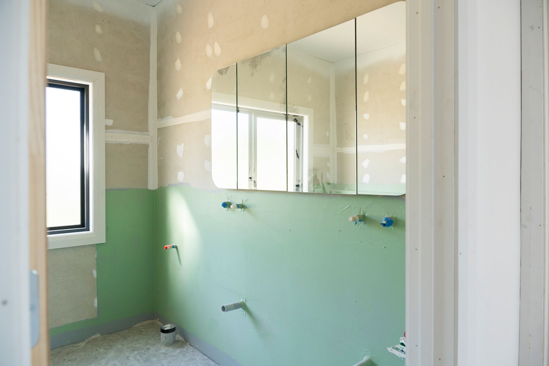 Partially Renovated Bathroom With Green Lower Walls — Matt Made Building in Camden, NSW