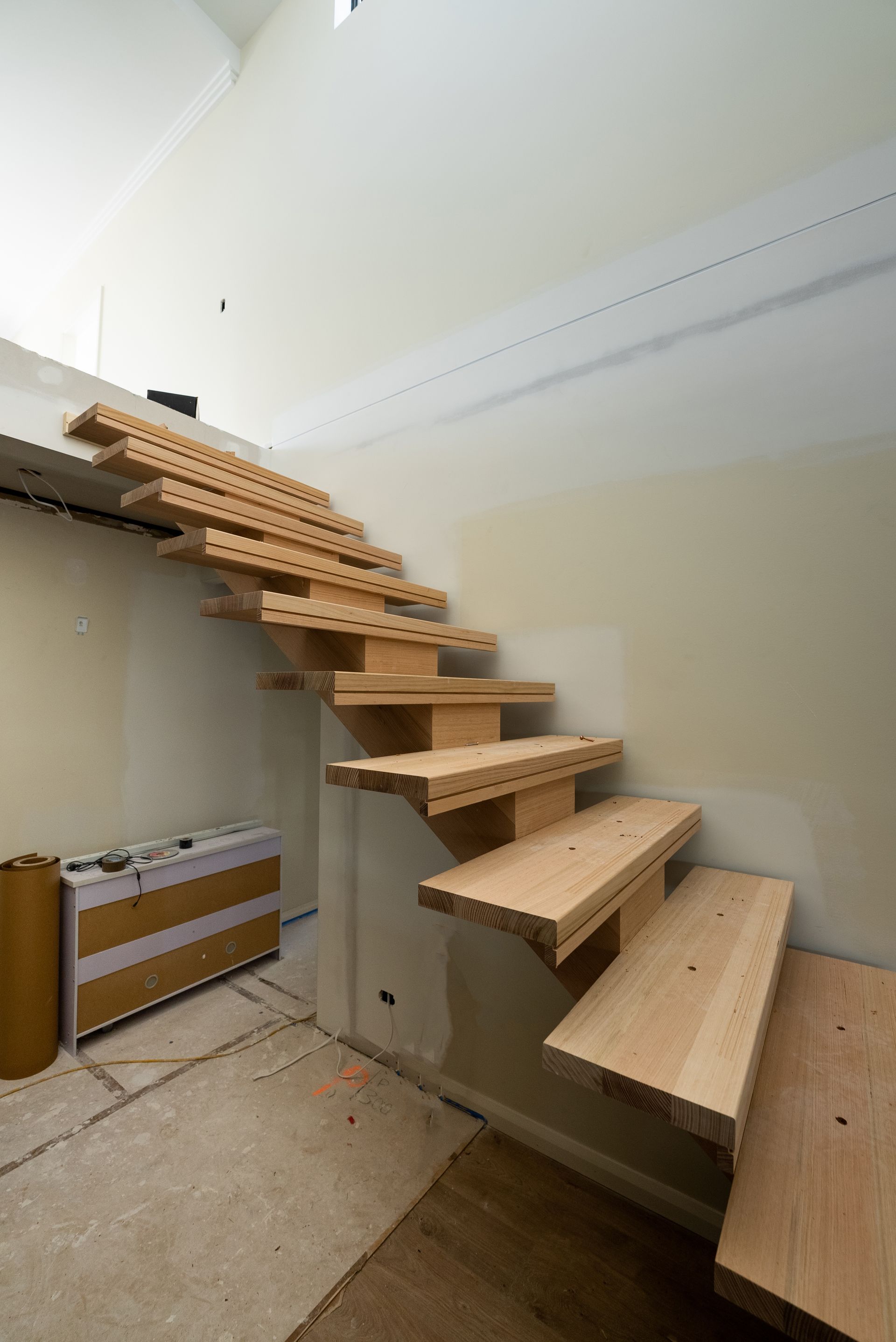 Wooden Staircase Under Construction in a Narrow Room and a Small Platform — Matt Made Building in Camden, NSW