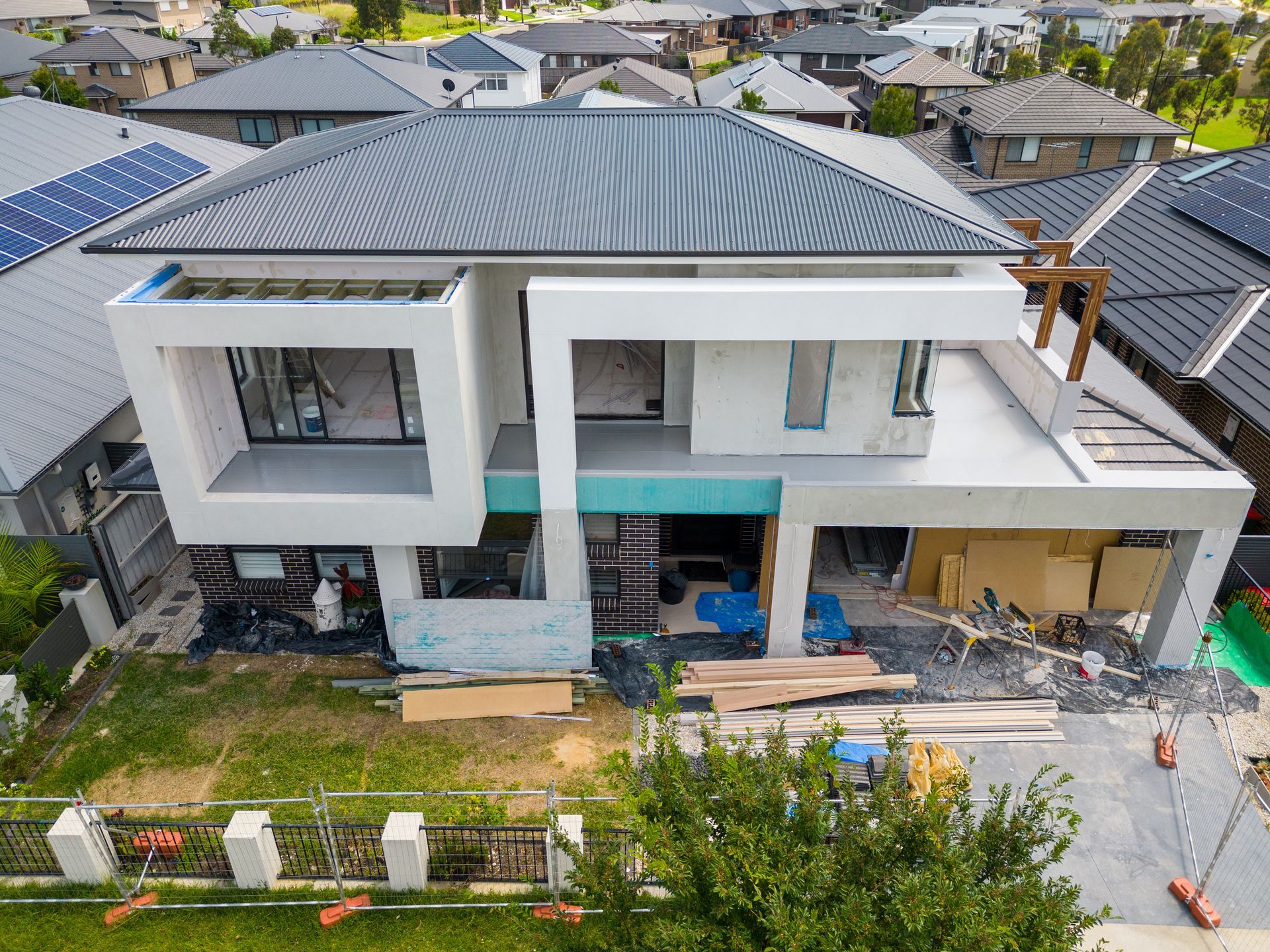 Modern Two-story House Under Construction With Gray Roof — Matt Made Building in Camden, NSW