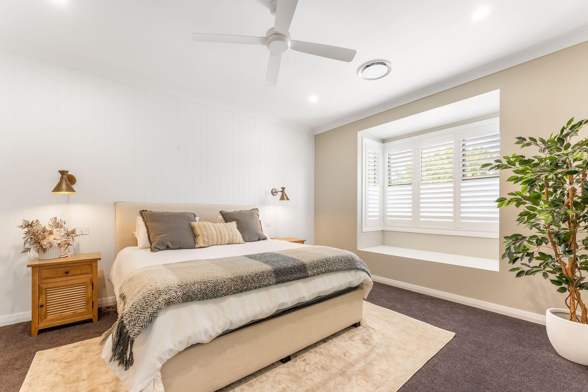 Bright Modern Bedroom With a Bed and Large Window With Blinds — Matt Made Building in Camden, NSW
