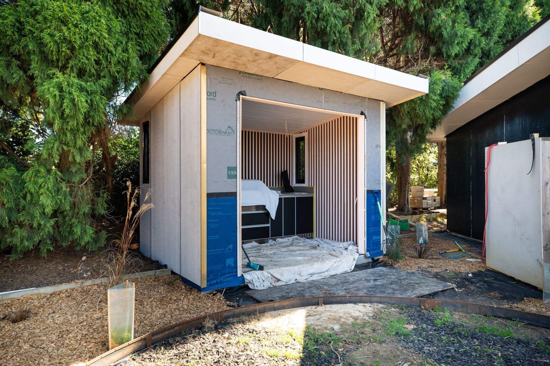 Small Outdoor Portable Restroom Booth With Blue and White Siding — Matt Made Building in Camden, NSW