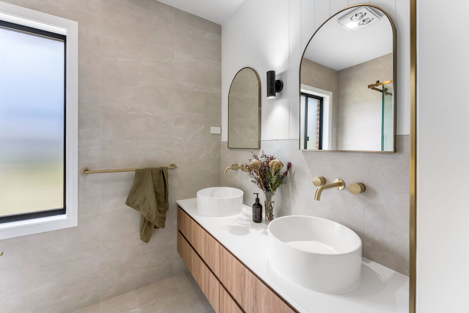 Modern Bathroom With Double Sink Vanity and Frosted Window — Matt Made Building in Camden, NSW