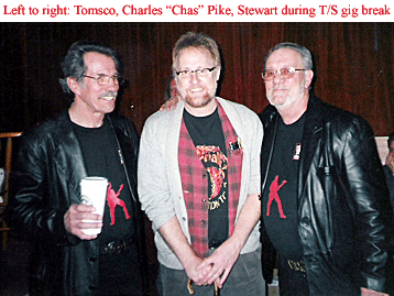 three men smiling