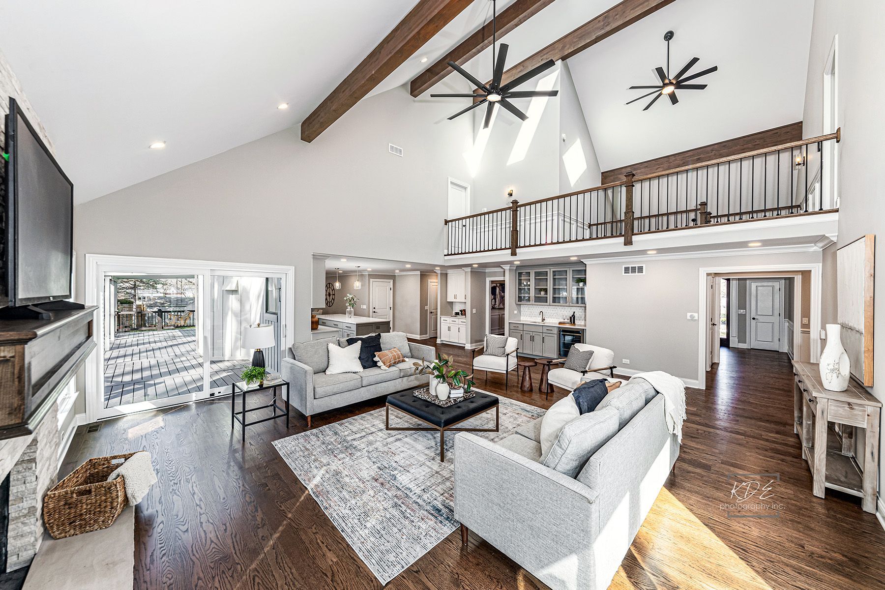 A living room filled with furniture and a flat screen tv.
