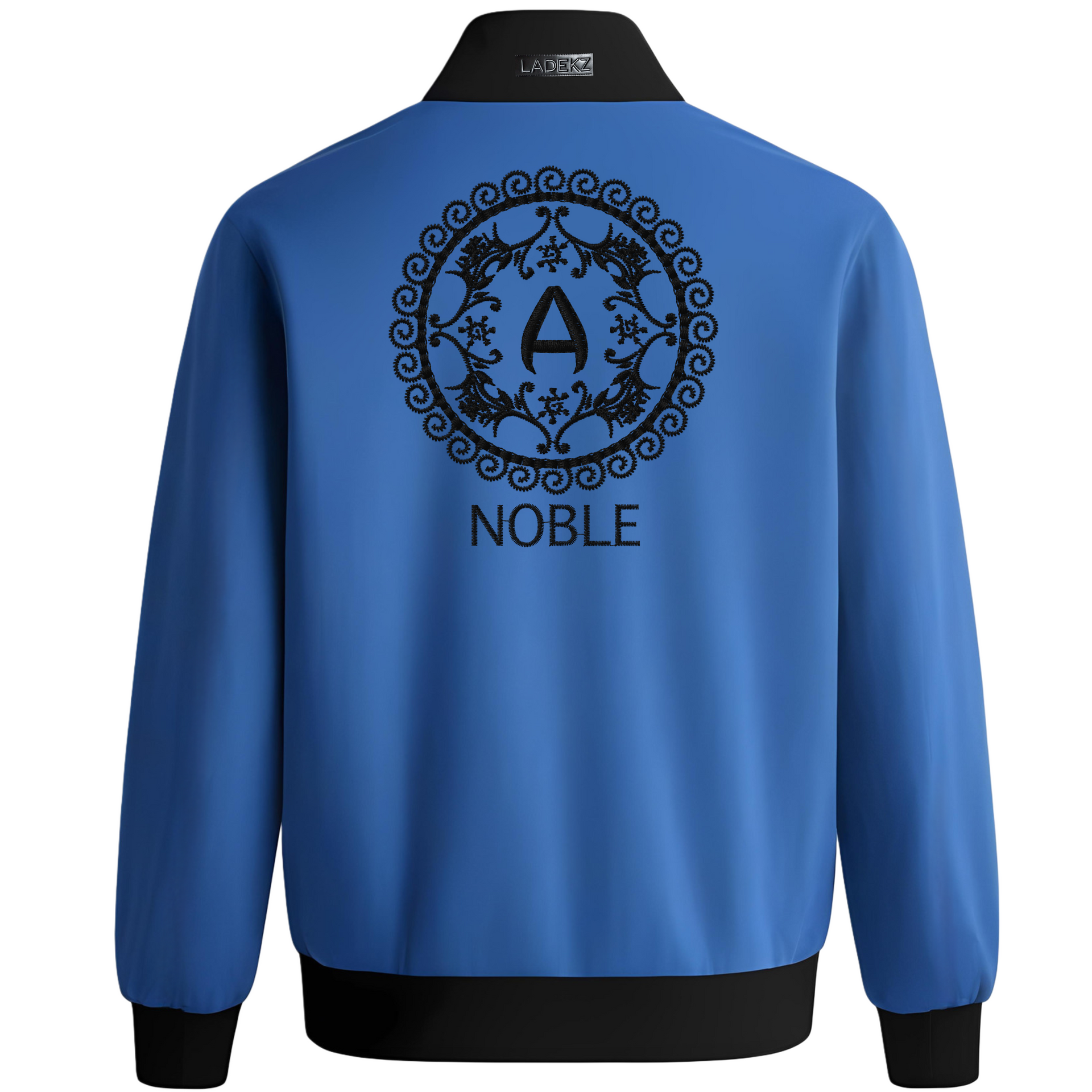 Blue bomber jacket with black trim. Features a black circular design with the letter