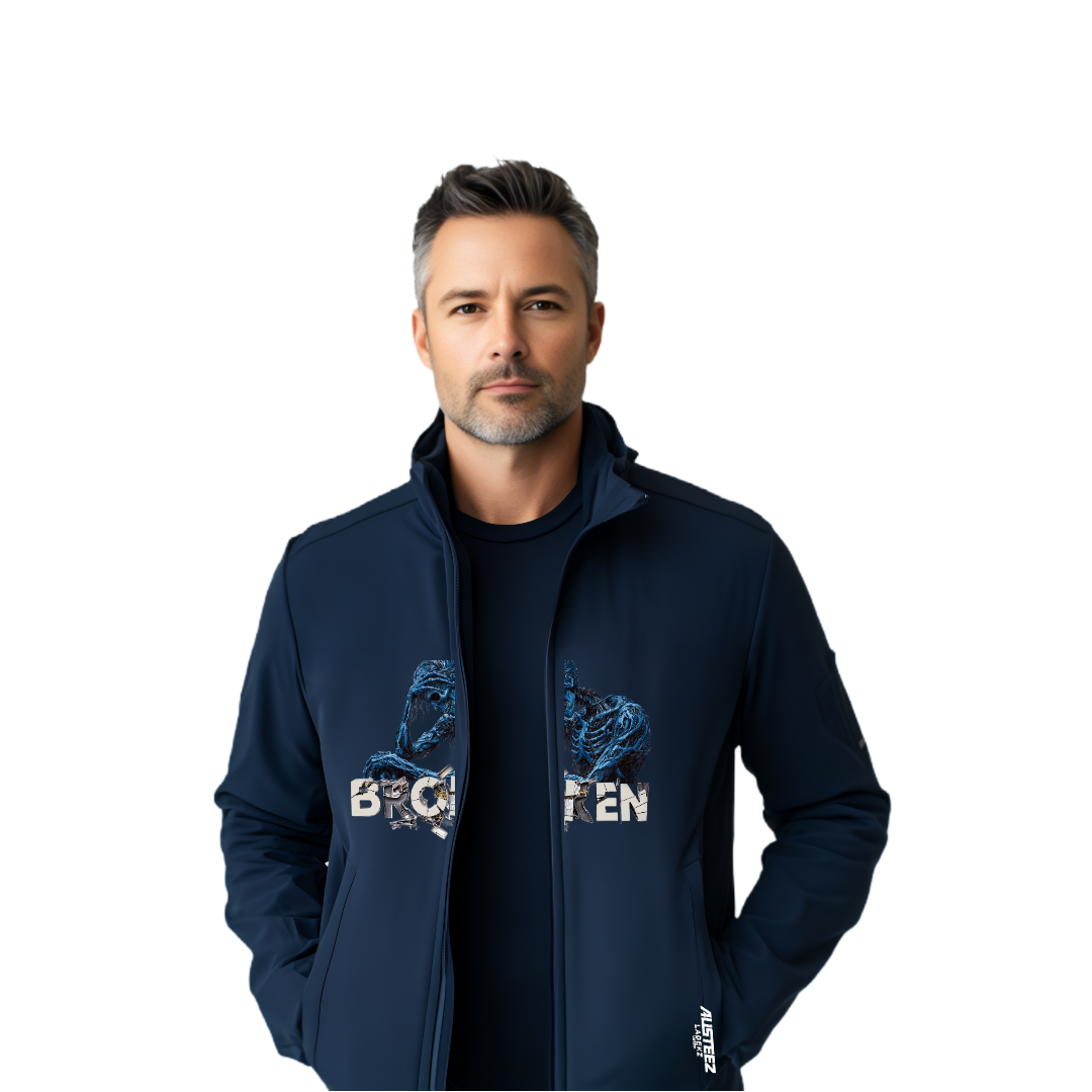 Man in navy jacket with graphic, looking forward.
