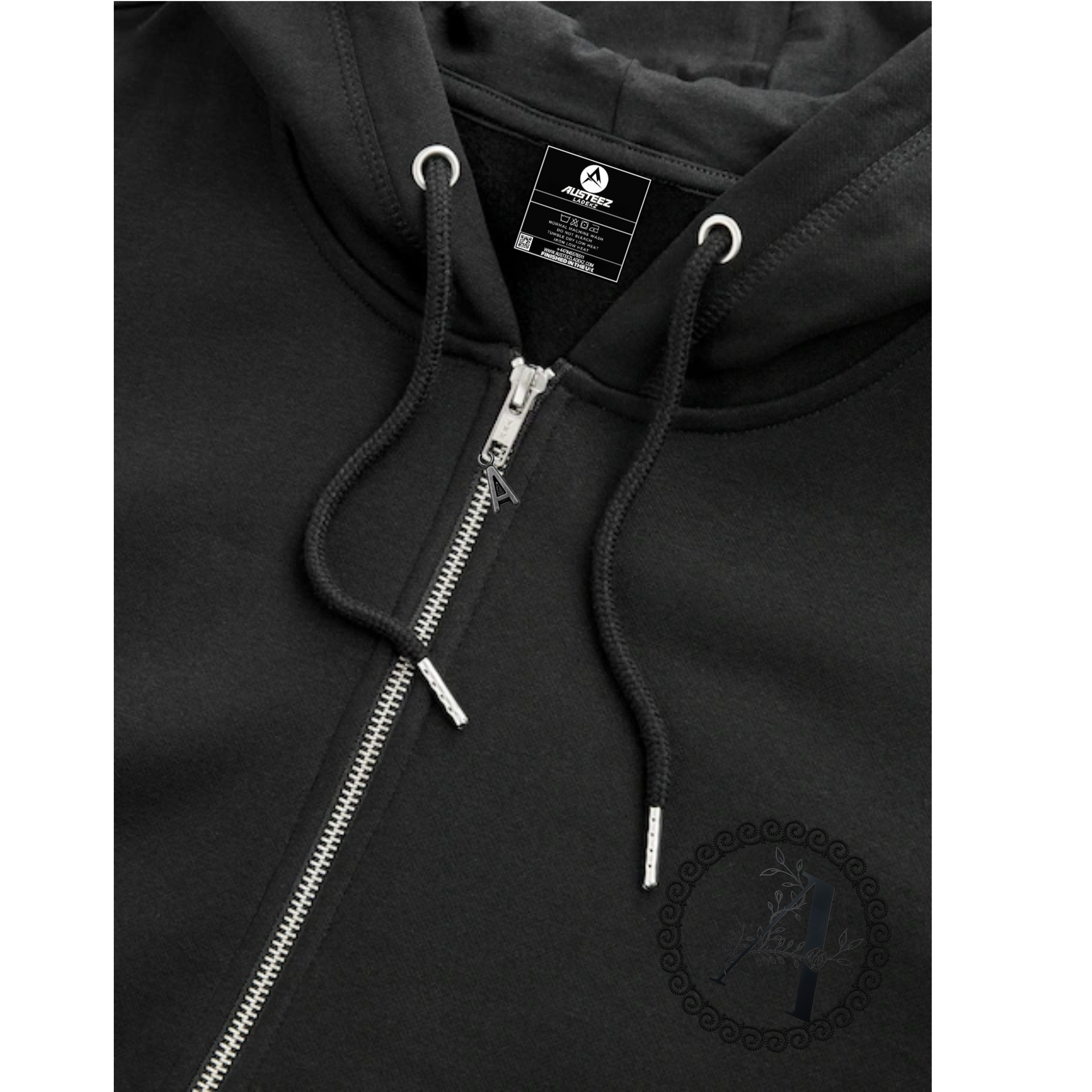 Black zip-up hoodie with drawstring, silver zipper, and logo on the chest.
