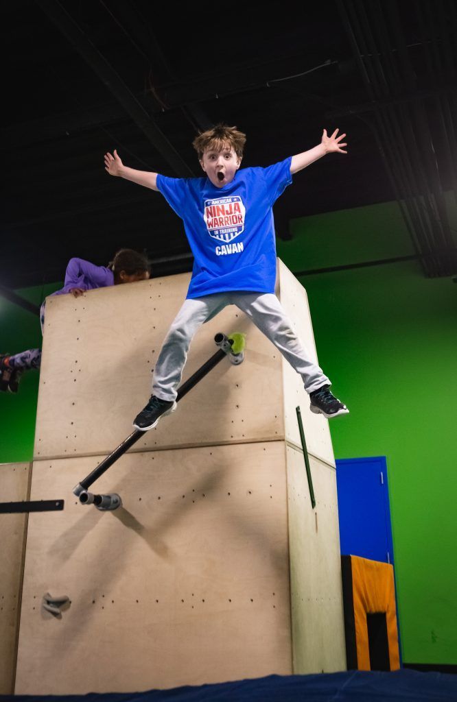Young boy jumping 