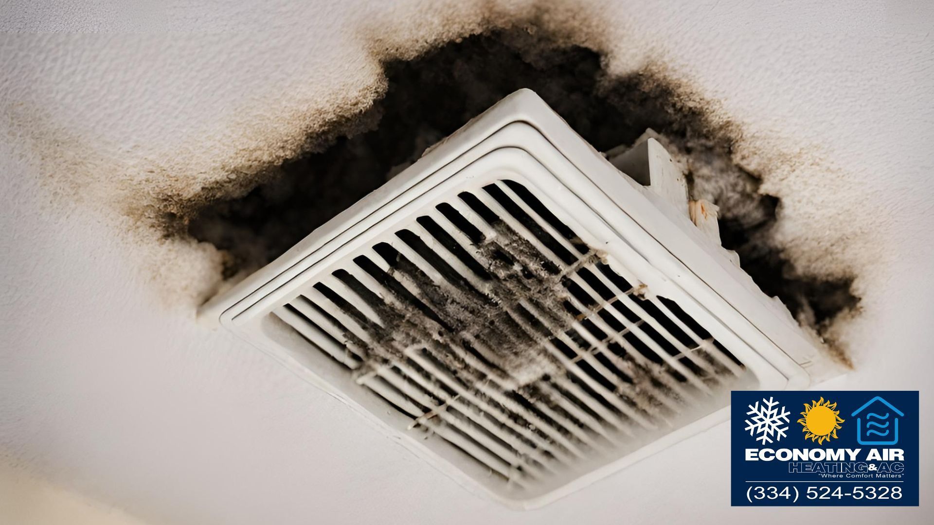 A dirty exhaust fan is hanging from the ceiling.