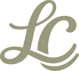Stylized gold cursive “LC” monogram on a white background