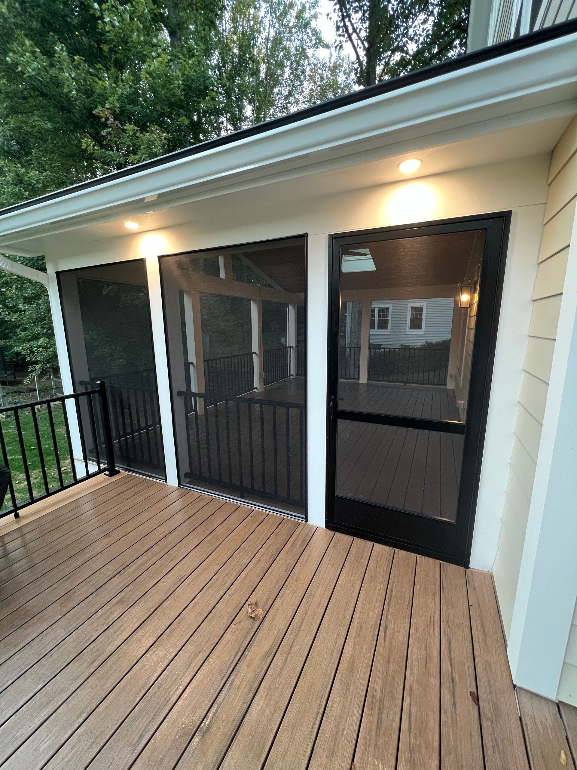 Timbertech Screened-In Porch and deck with Westbury Handrails and ScreenEZE in Chantilly, VA