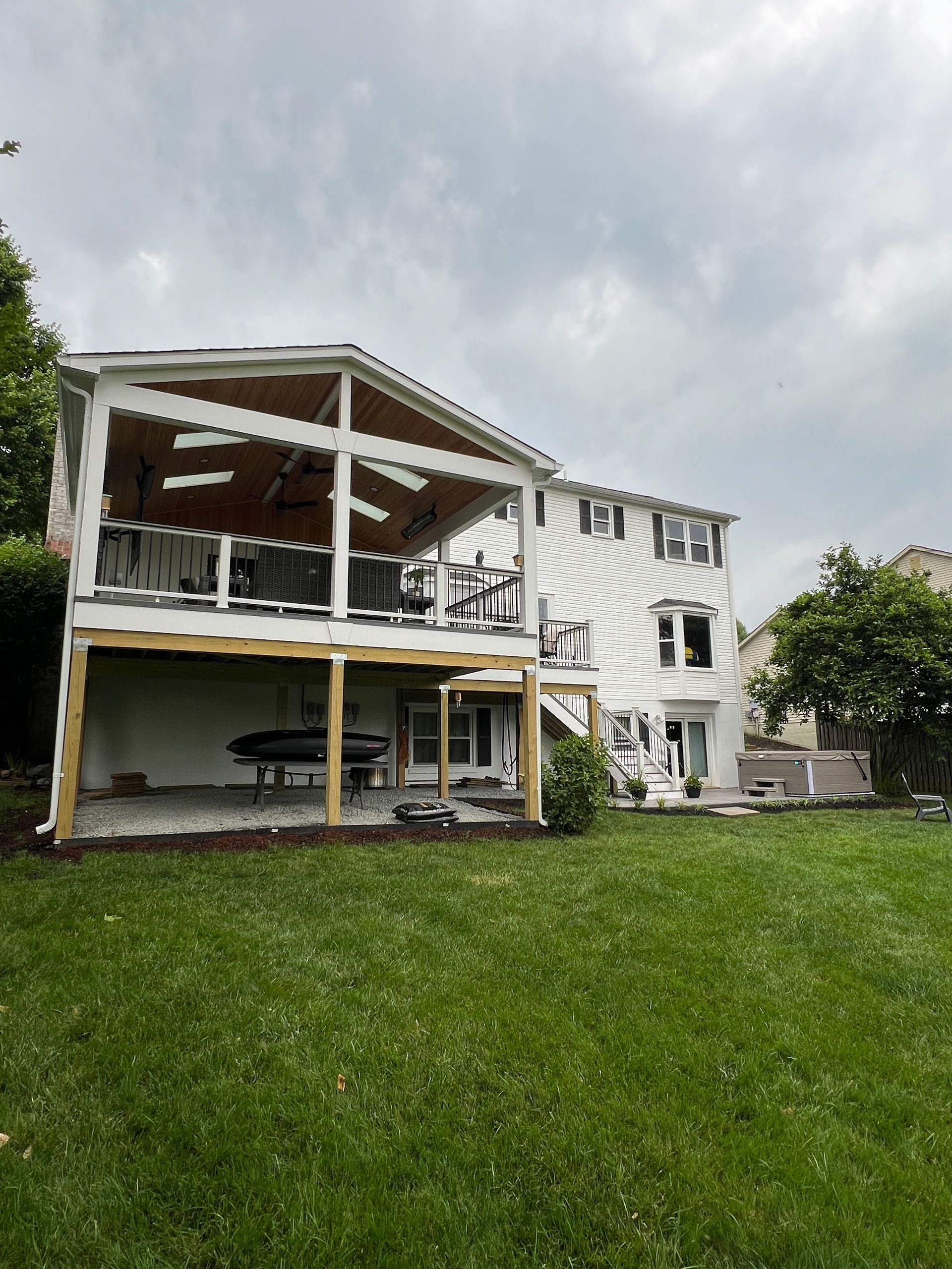 Trex Open Porch with Heaters and Stamped Concrete patio in Leesburg, VA