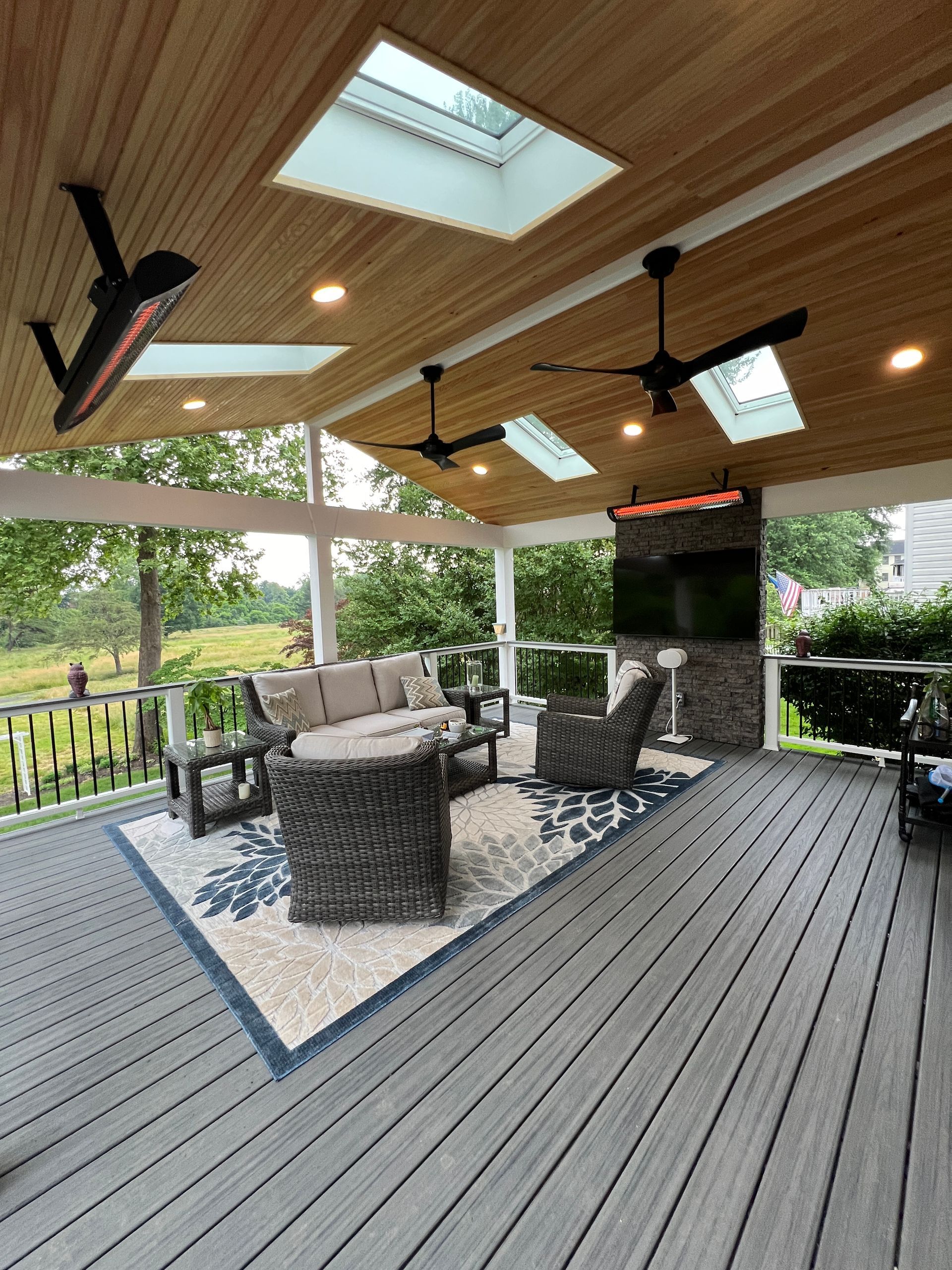 Trex Open Porch with Heaters and Stamped Concrete patio in Leesburg, VA