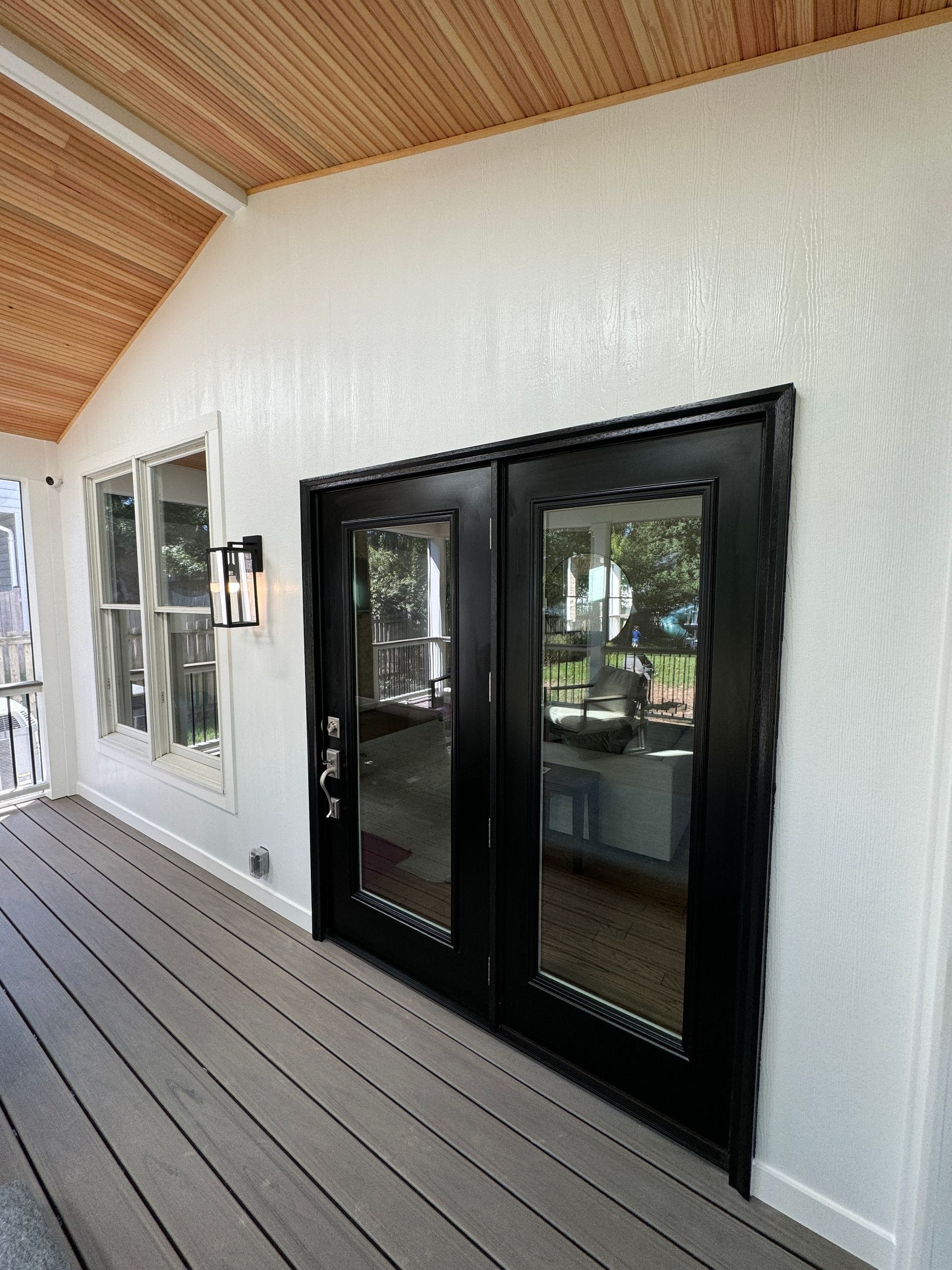 Trex screened-in porch with Screen eze, heaters and TV wall in Vienna, VA