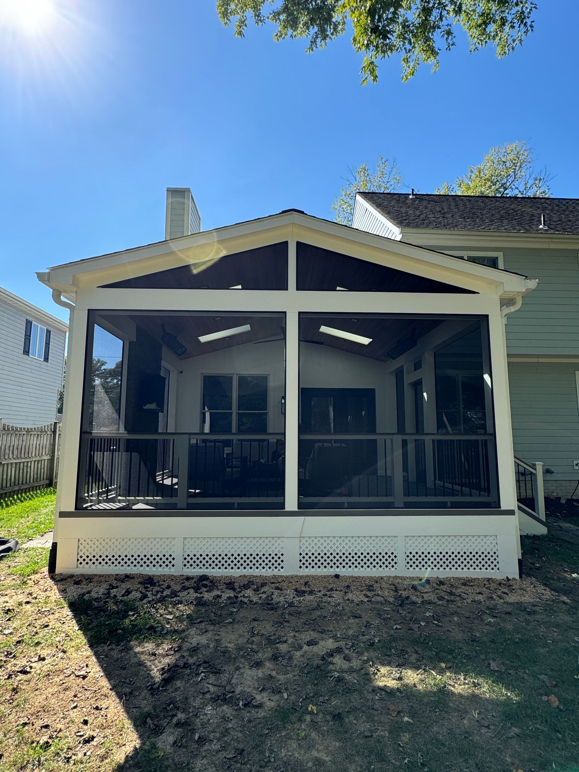 Trex screened-in porch with Screen eze, heaters and TV wall in Vienna, VA