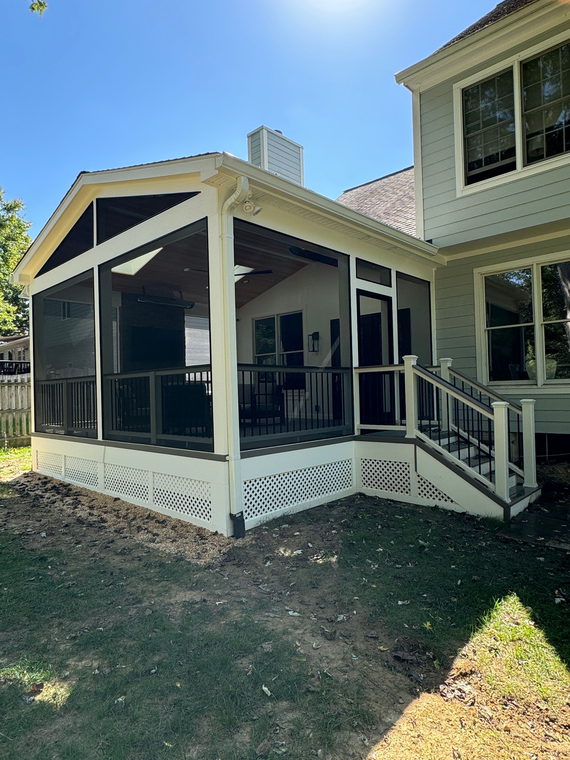 Trex screened-in porch with Screen eze, heaters and TV wall in Vienna, VA