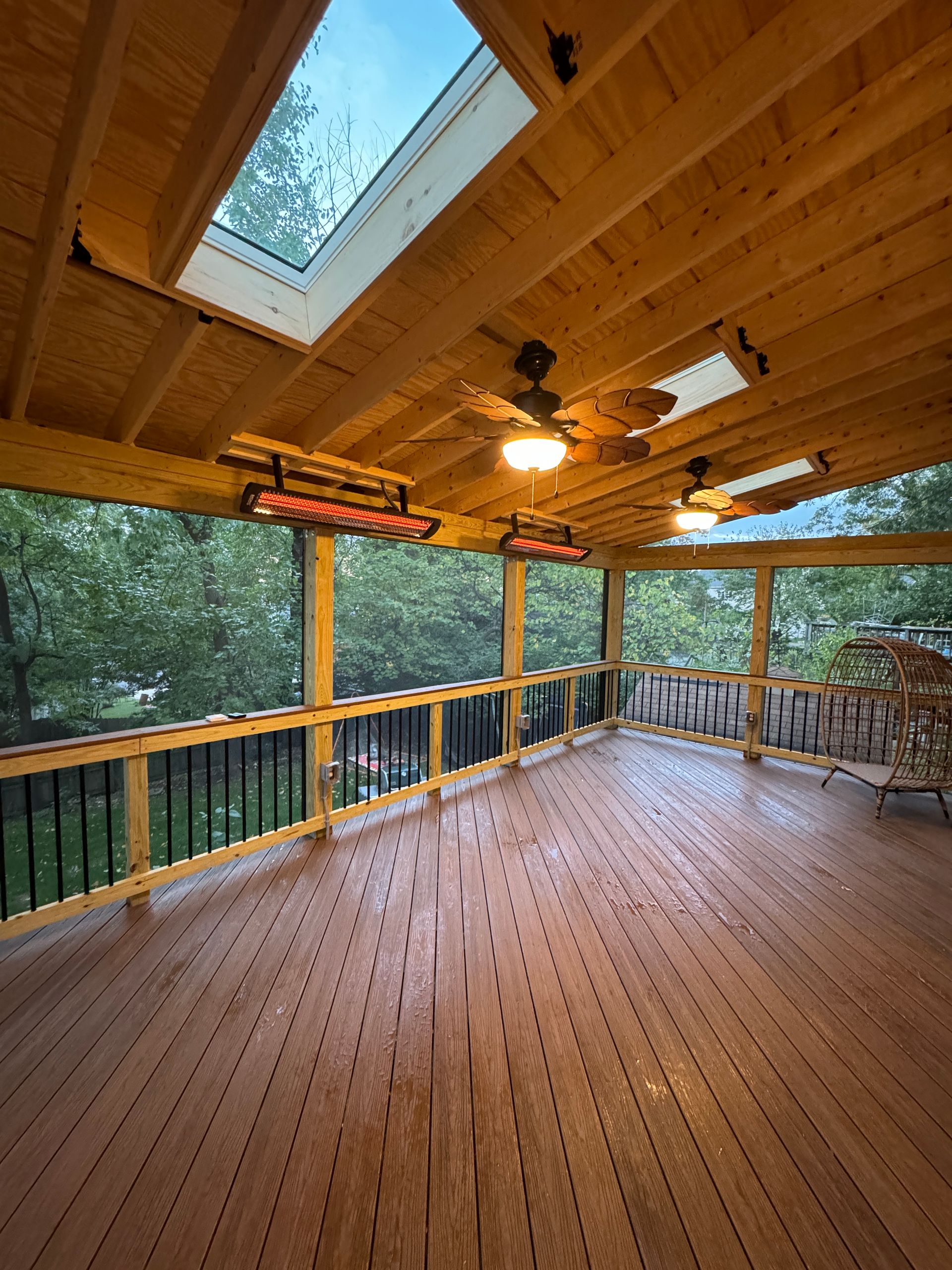 Pressure Treated wood and Fiberon screened-in porch with Screeneze, and heaters in Mclean, VA
