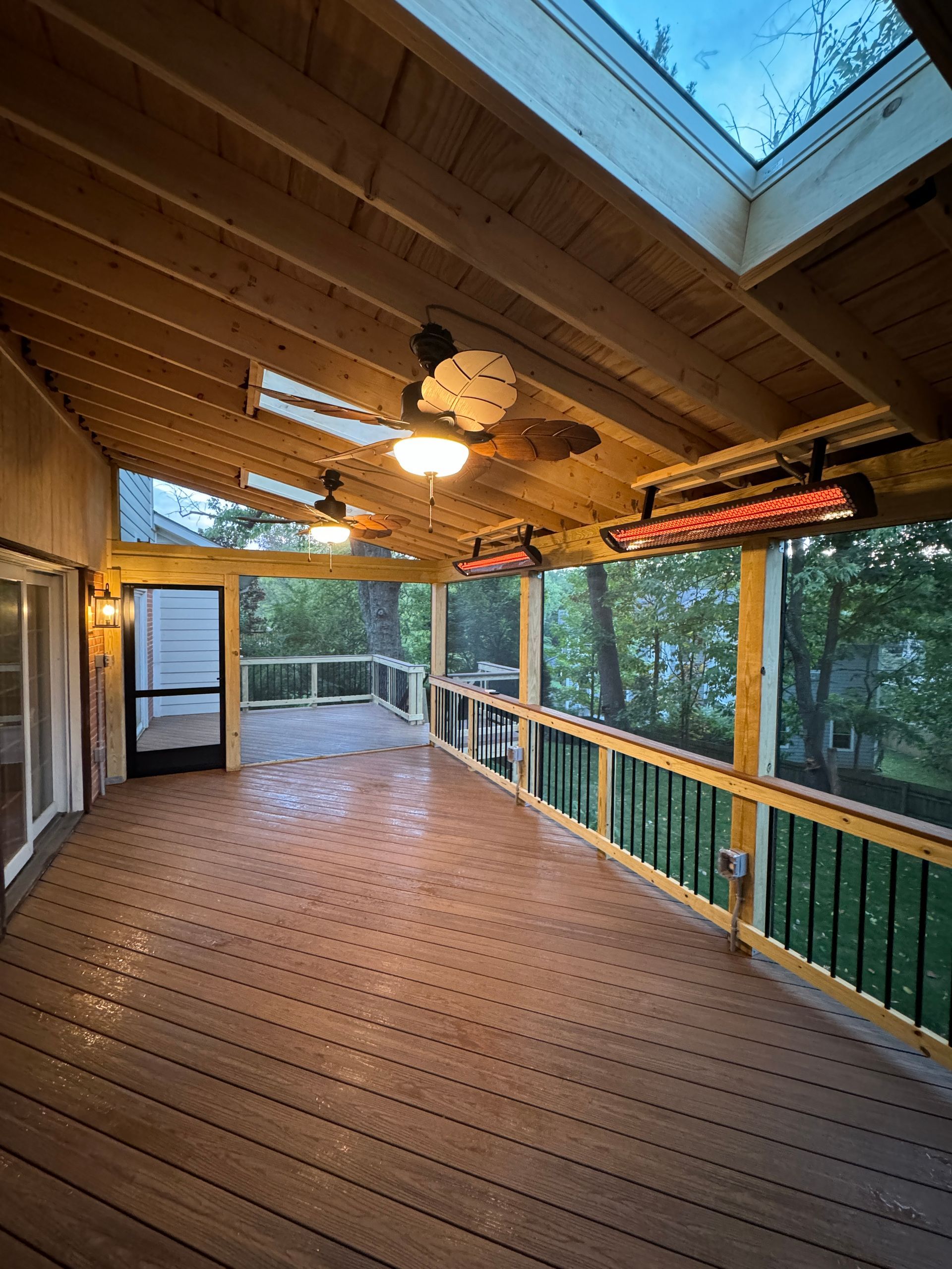 Pressure Treated wood and Fiberon screened-in porch with Screeneze, and heaters in Mclean, VA