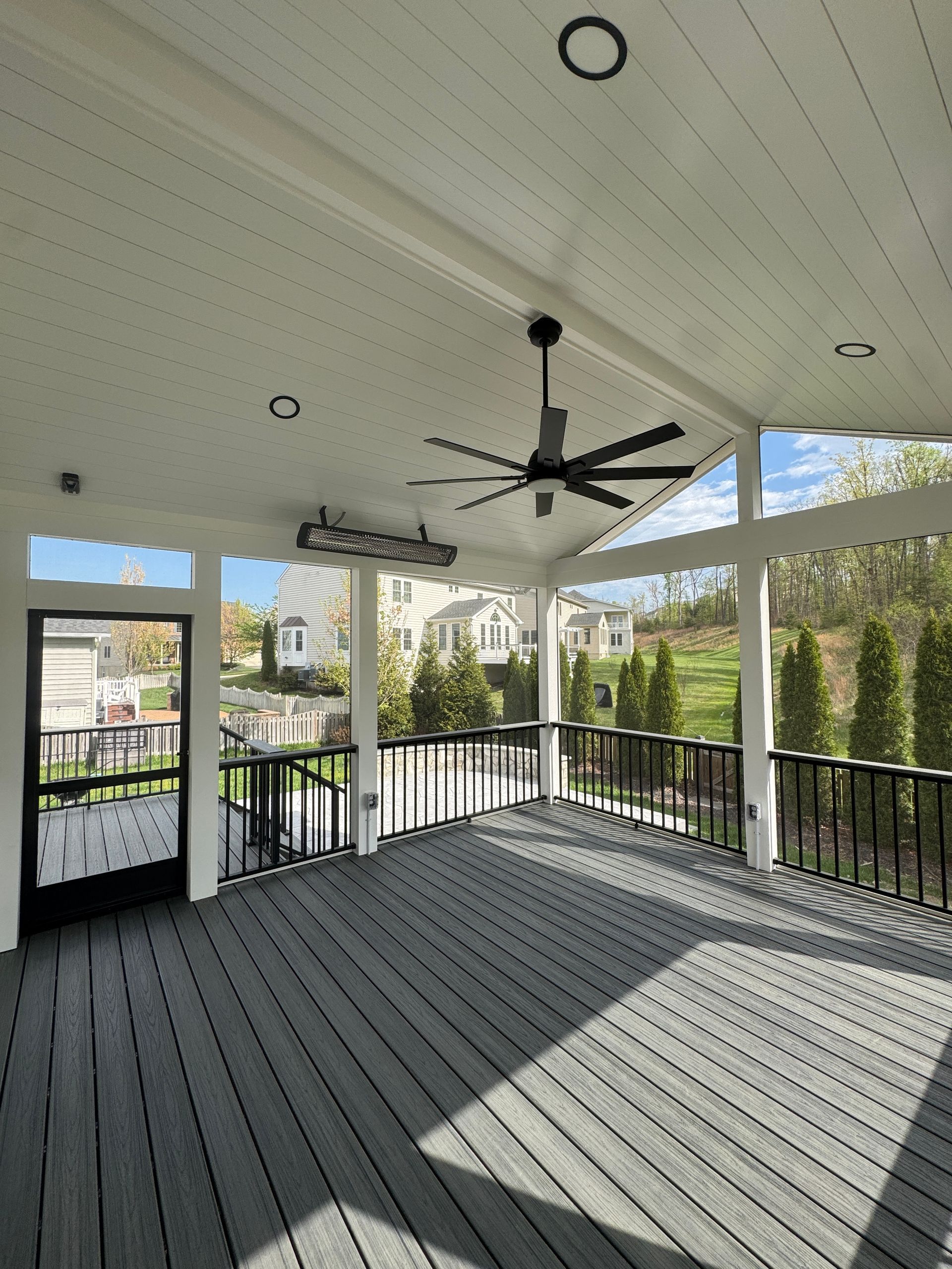 Trex screened in porch with Screen-Eze and Westbury Aluminum handrails, and Stamped Concrete in Aldie, VA