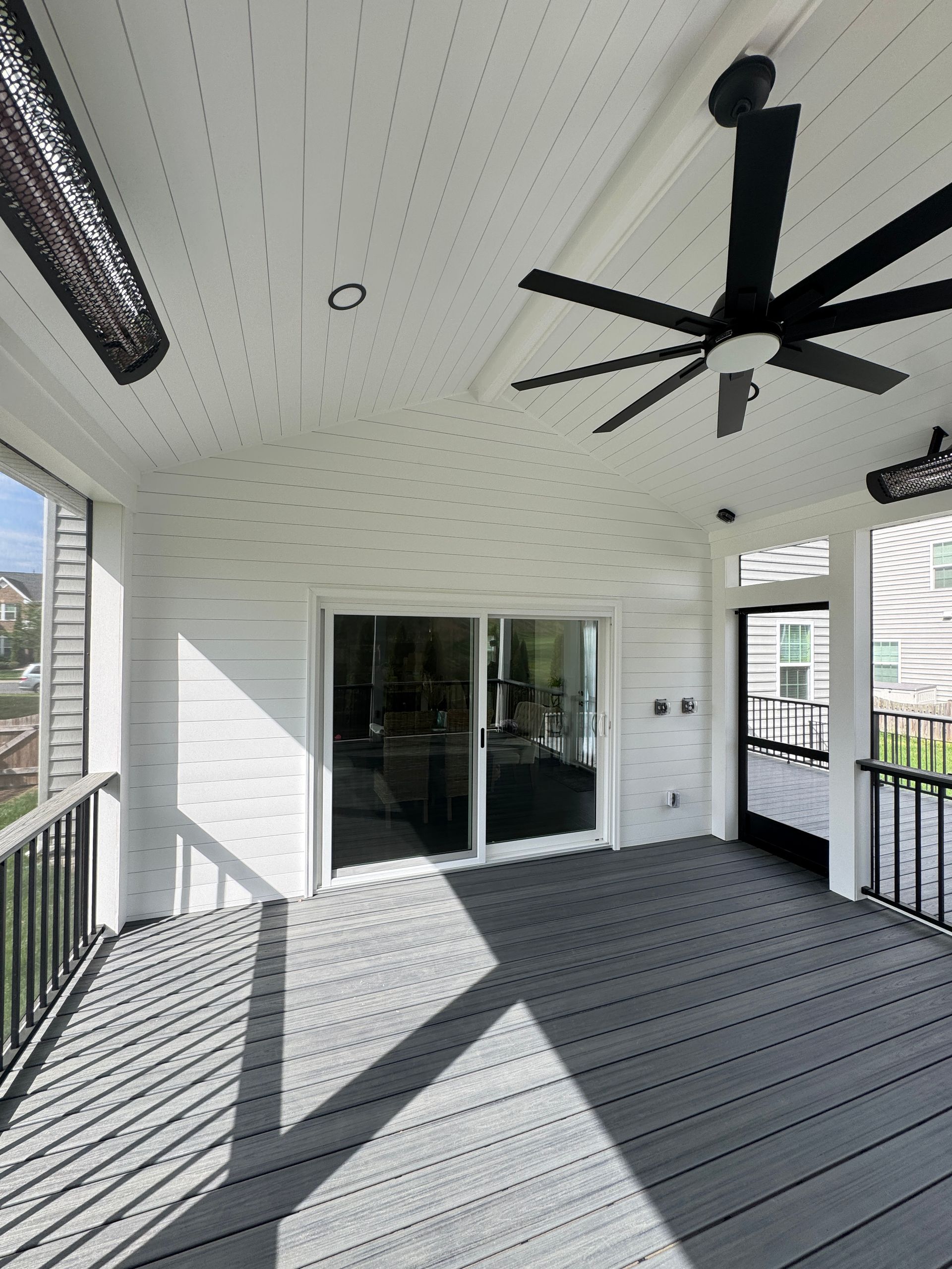 Trex screened in porch with Screen-Eze and Westbury Aluminum handrails, and Stamped Concrete in Aldie, VA
