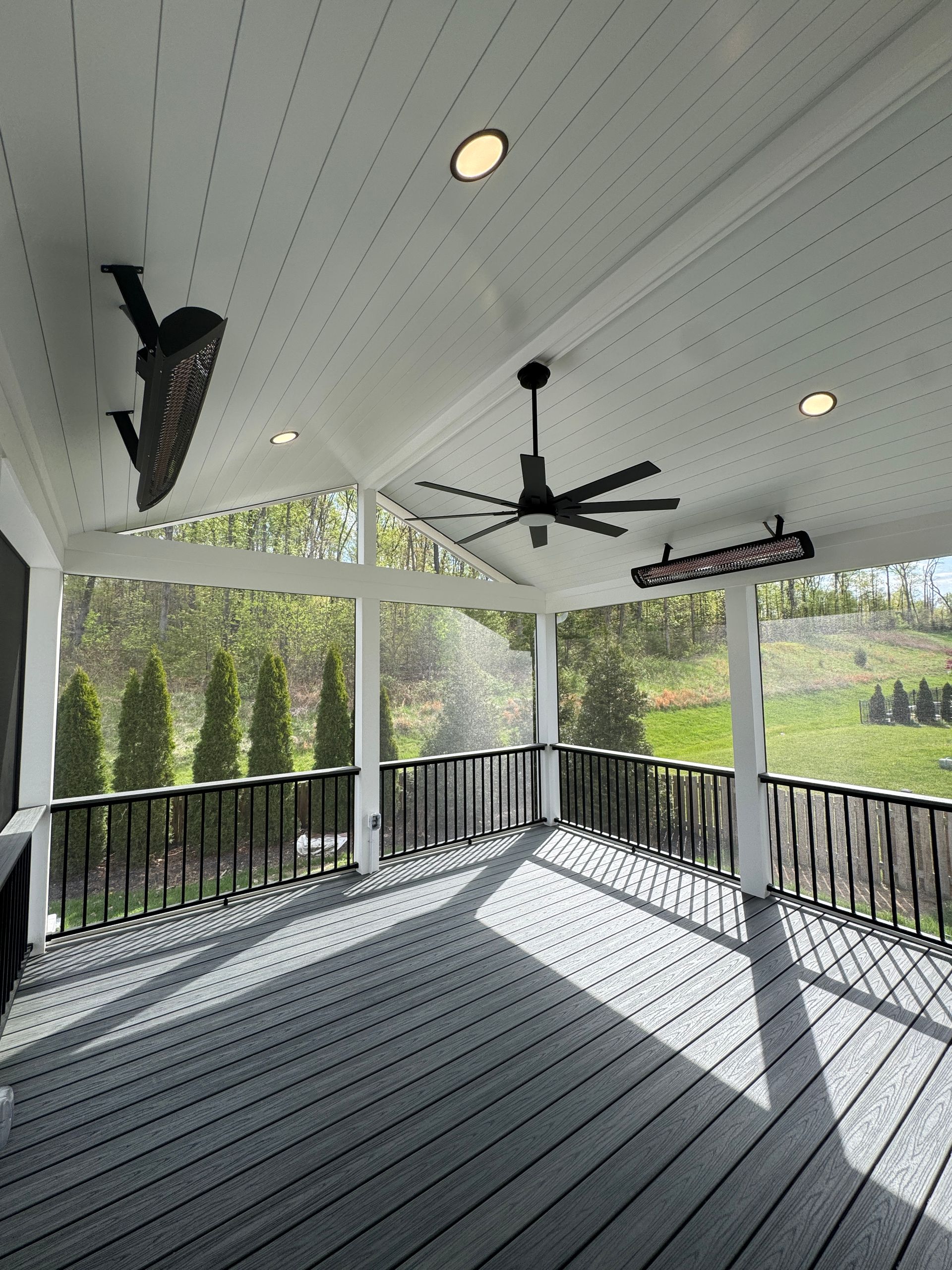 Trex screened in porch with Screen-Eze and Westbury Aluminum handrails, and Stamped Concrete in Aldie, VA