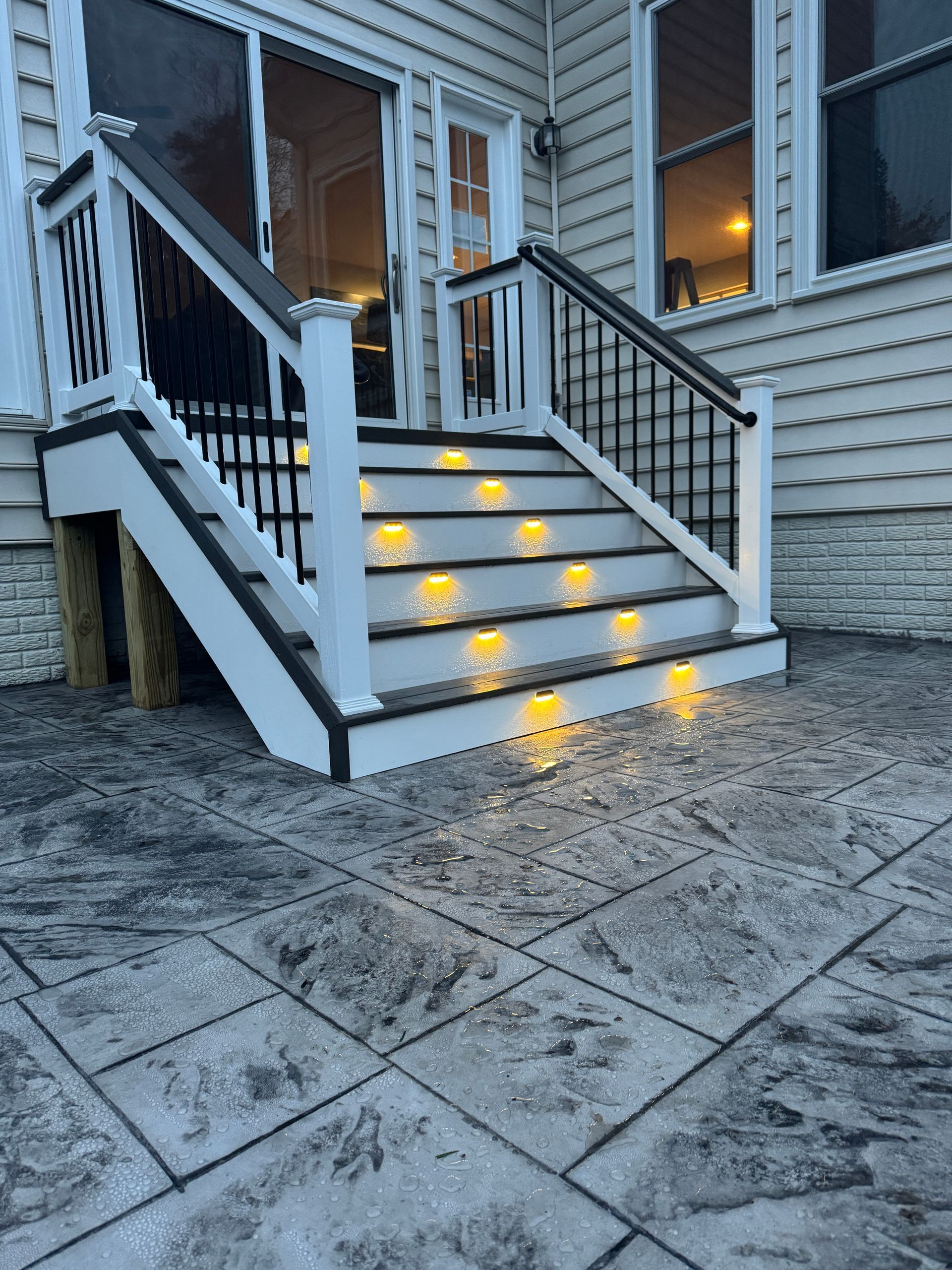 stamped concrete patio with fiberon deck steps in aldie, va