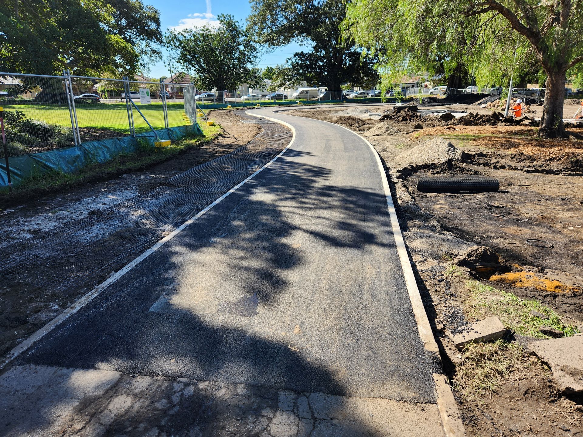 New Asphalt Path Winding Through A Park — TAC Asphalt Services in Warners Bay, NSW
