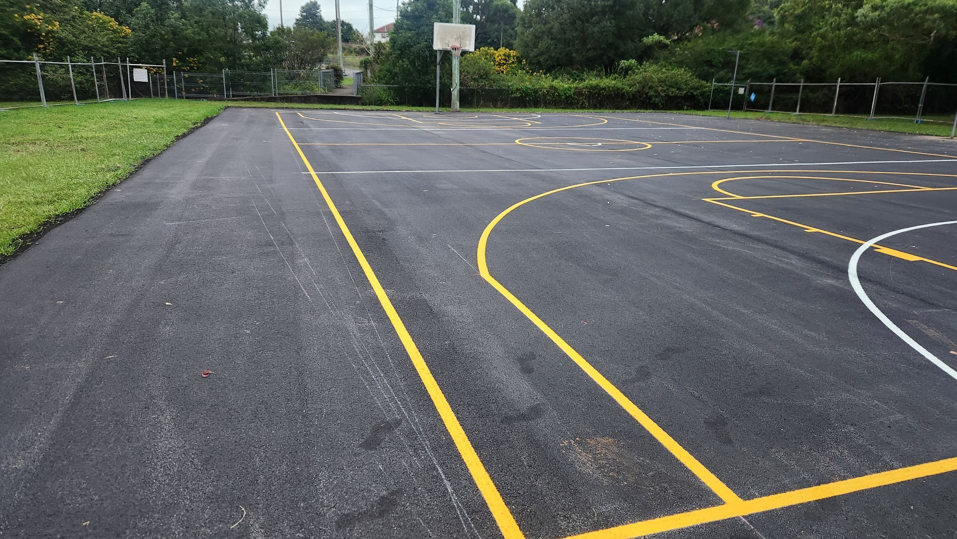 Asphalt Playground With Yellow And White Painted Lines For Games — TAC Asphalt Services in Warners Bay, NSW
