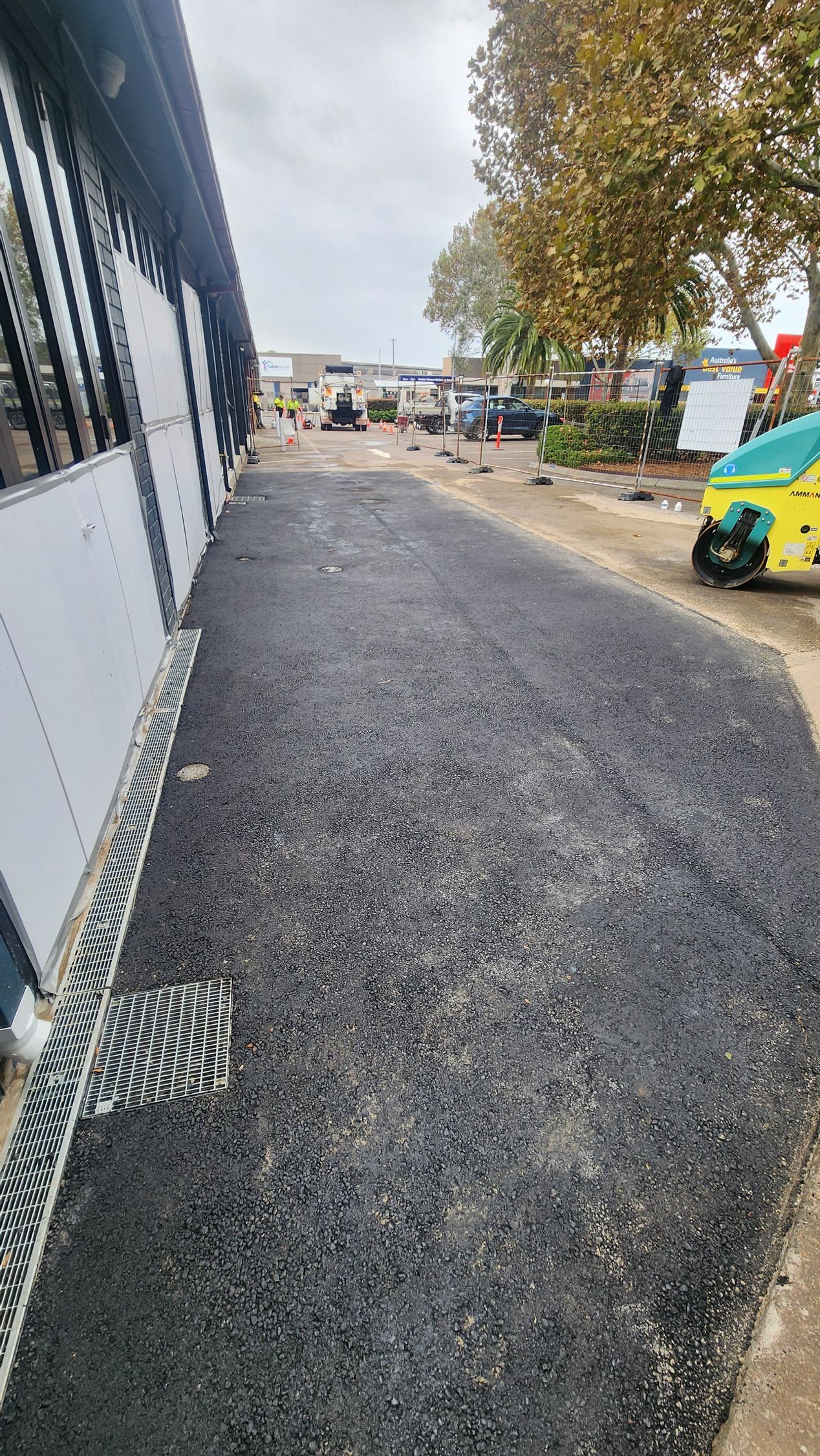 Asphalt Pathway Next To Building — TAC Asphalt Services in Warners Bay, NSW