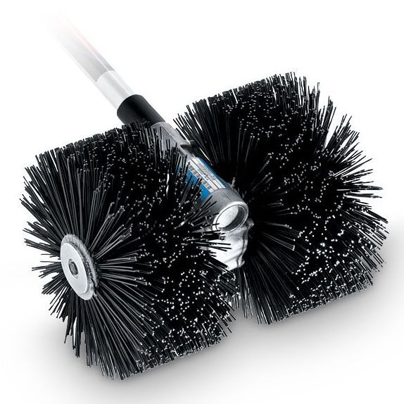 A close up of a sweeper brush on a white background
