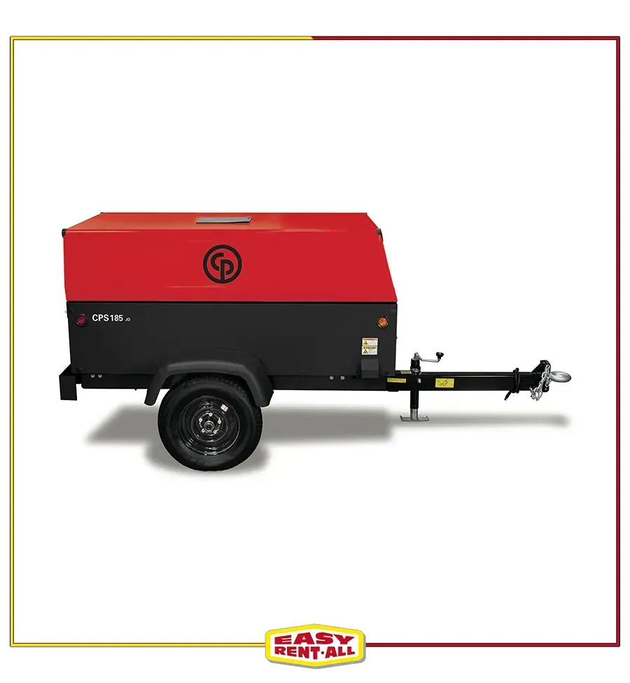 A red and black air compressor on a trailer.