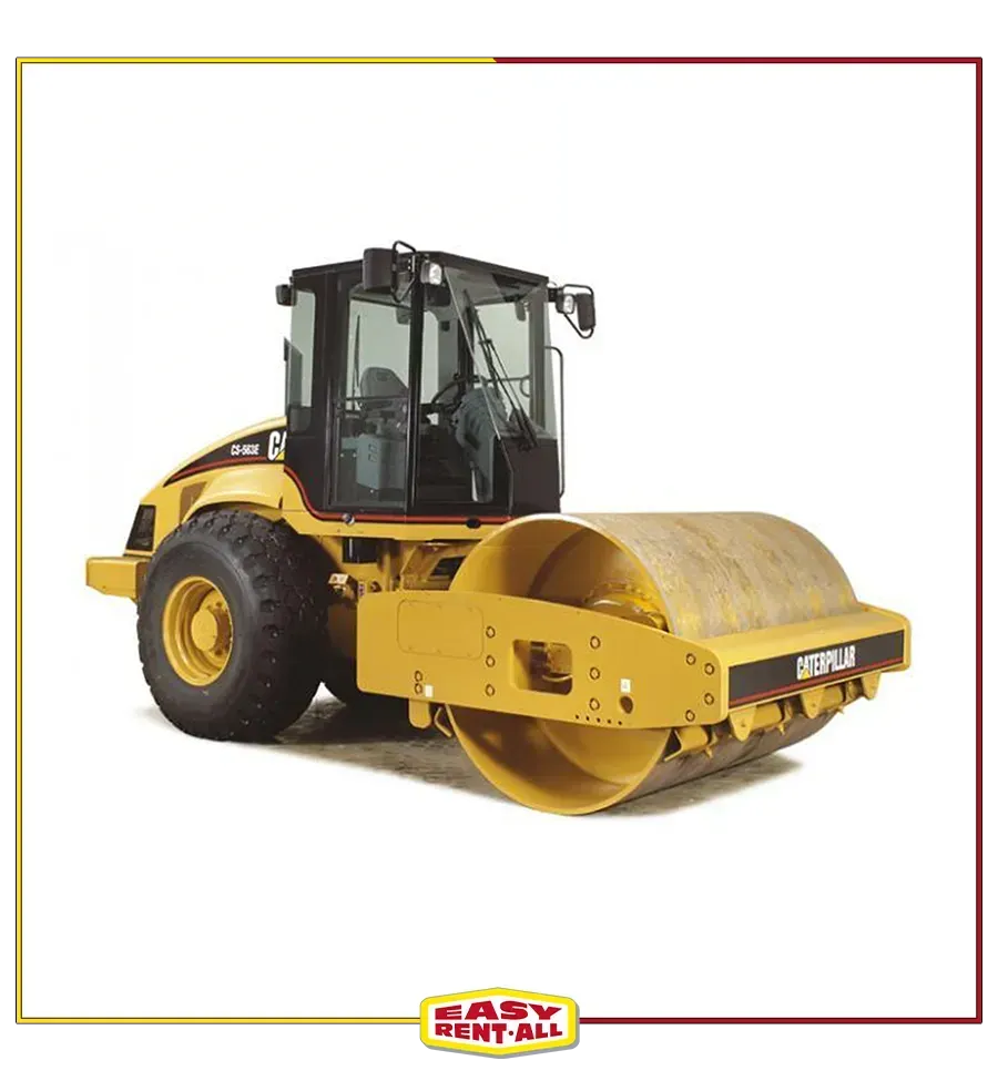 A yellow tractor with a large roller on it